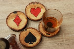 Wooden coasters with playing card suit motif design