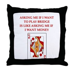 throw pillow that reads asking me to play bridge is like asking me if I want money