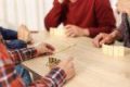 Friends playing dominoes