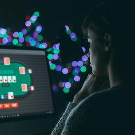 Woman playing online poker