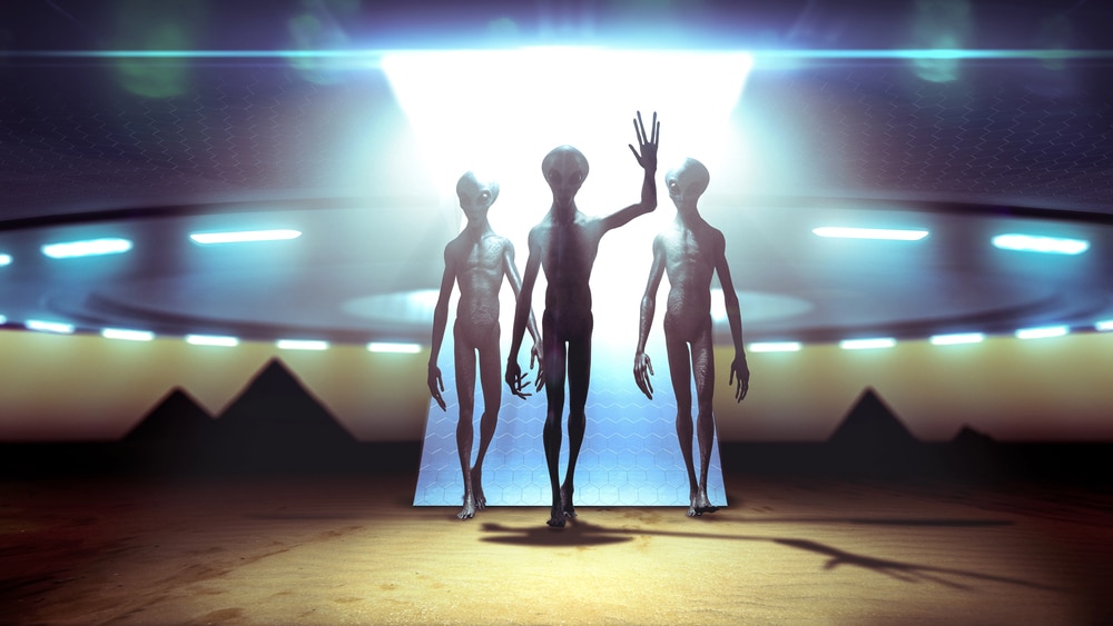 Aliens landing with ufo on earth coming in peace near pyramids